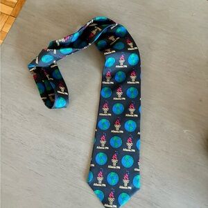 Stylish Official 1996  Olympic themed tie in Navy and Teal